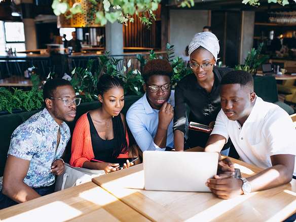People collaborating on laptop